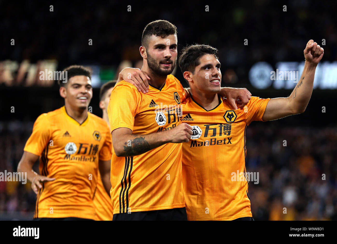 Wolverhampton Wanderers' Lomba Pedro Neto (right) celebrates scoring his side's first goal of the game with teammate Patrick Cutrone during the UEFA Europa League Third Qualifying Round Second Leg match at Molineux Stadium, Wolverhampton. Stock Photo