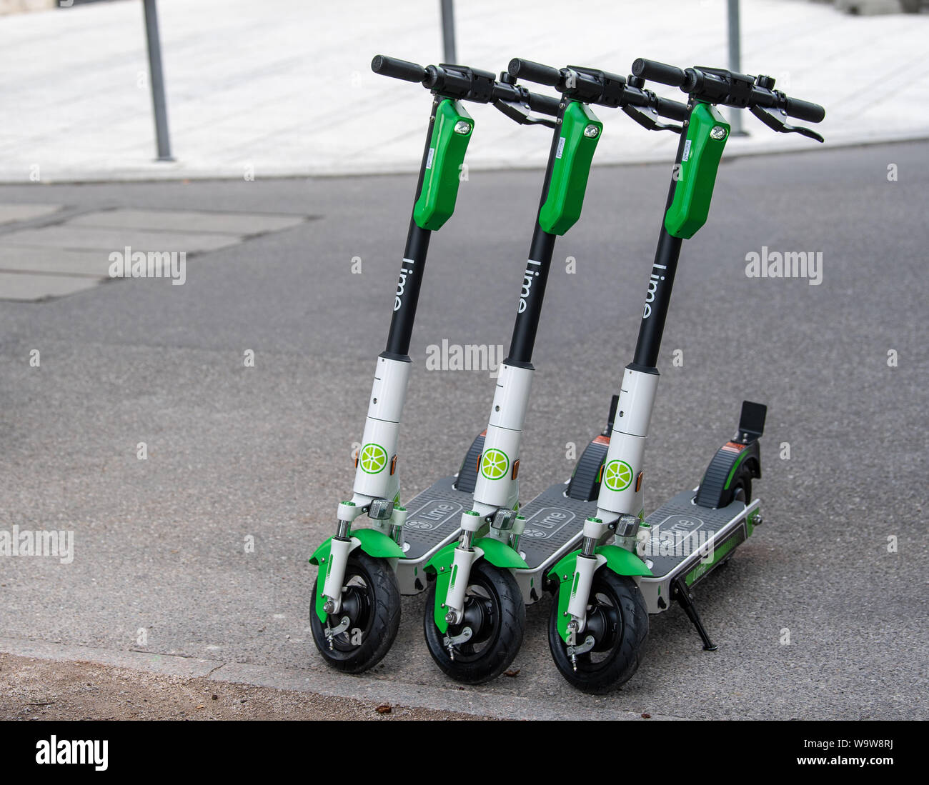 Stuttgart, Germany. 15th Aug, 2019. Three e-scooters from Lime are located  in downtown Stuttgart. The first scooters were set up on Thursday  (15.08.2019) by the German subsidiary of the US company Lime