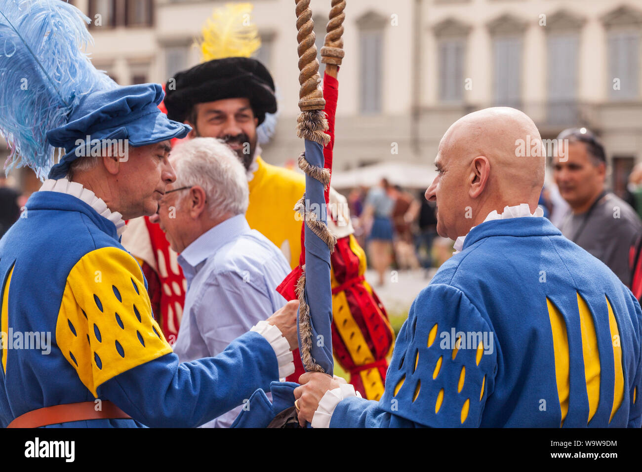 Traditional costumes at the Calcio Storico parade in Florence, Italy. Also known as Calcio Fiorentino the game is thought to be an early form of moder Stock Photo