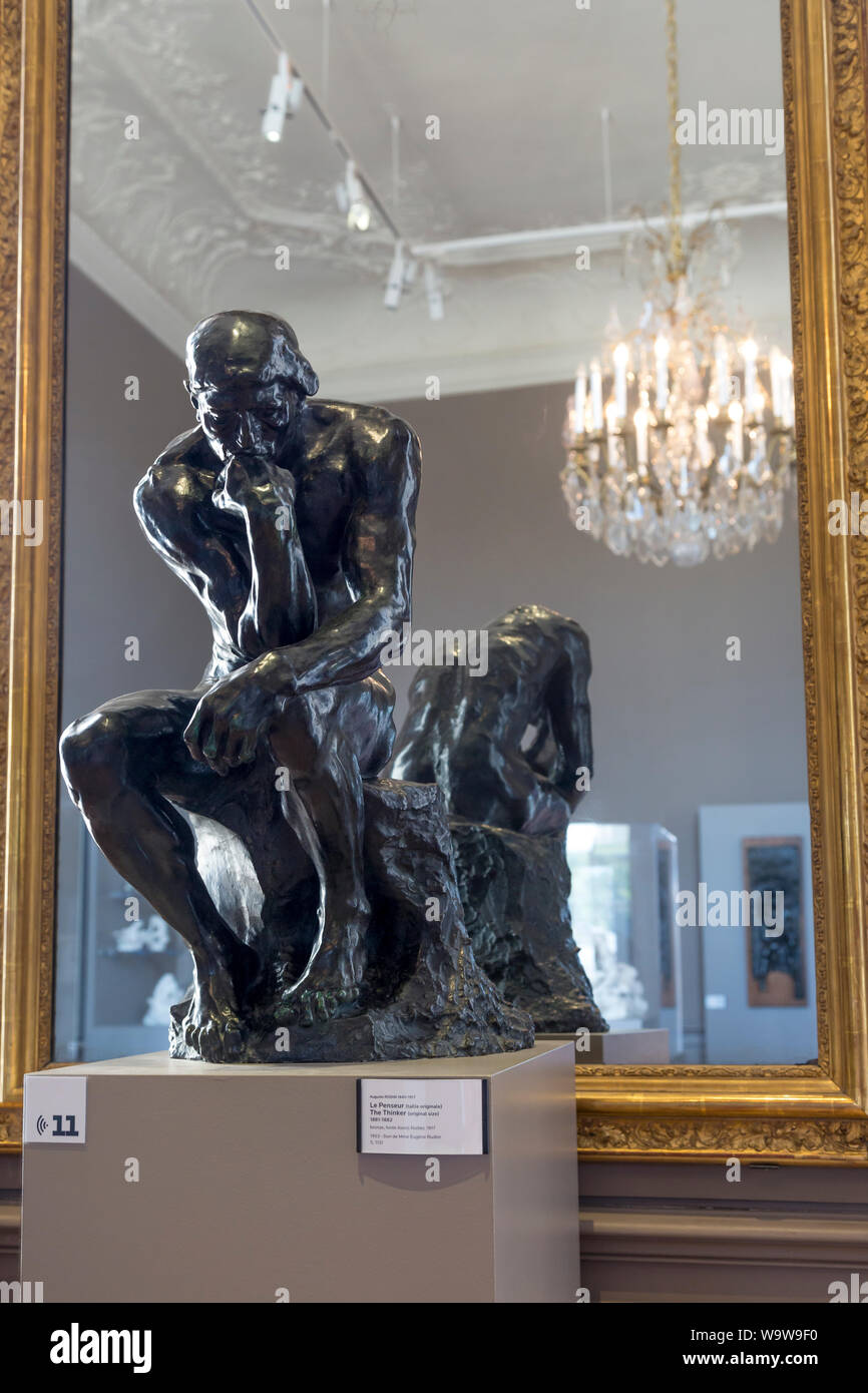 Le Penseur - The Thinker (original size), bronze sculpture by Auguste Rodin, on display at l'Hotel Biron, Musee Rodin, Paris France Stock Photo
