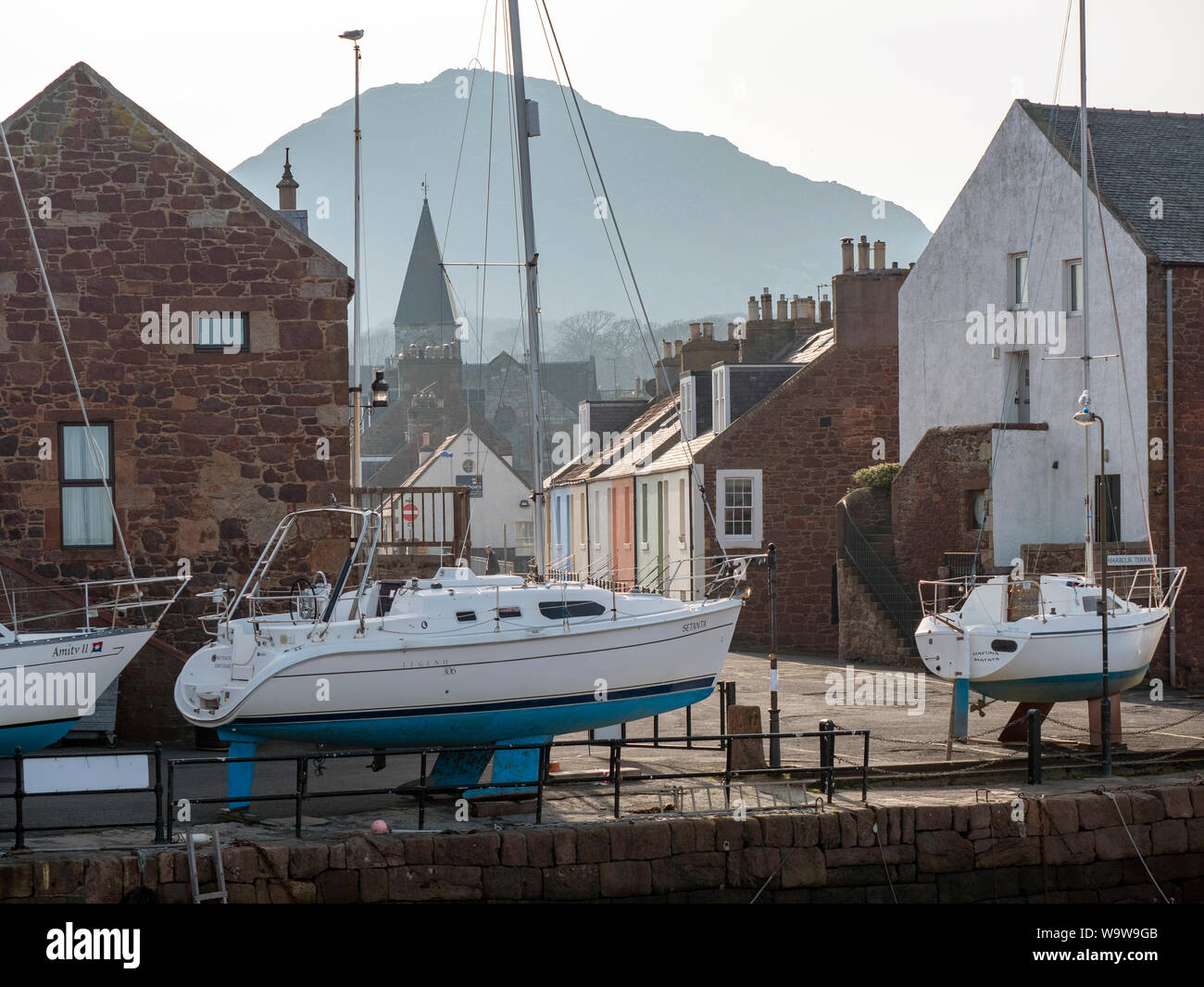 Victoria Road, North Berwick, with North Berwick Law in the background, from the harbour. Stock Photo