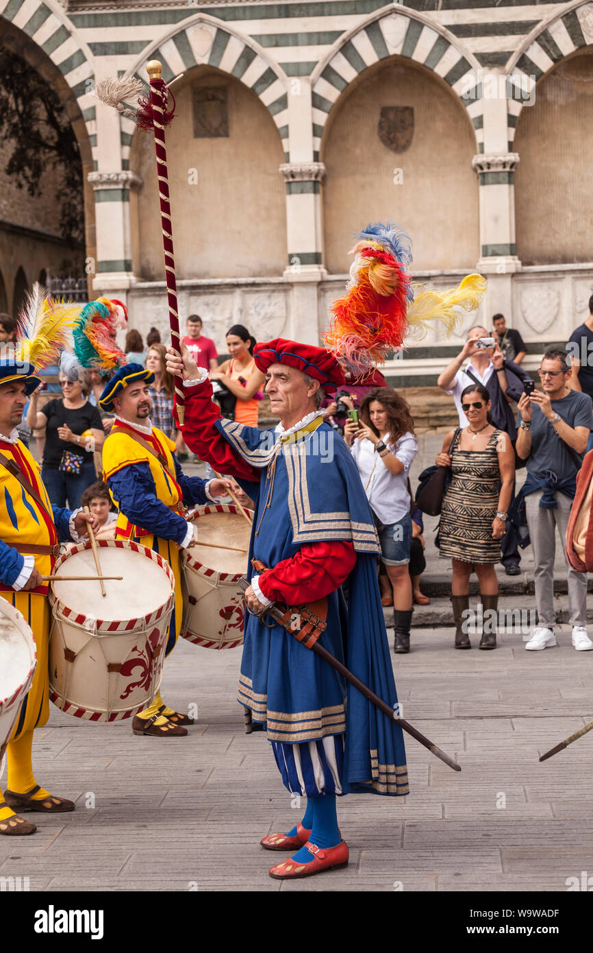 Traditional costumes at the Calcio Storico parade in Florence, Italy. Also known as Calcio Fiorentino the game is thought to be an early form of moder Stock Photo