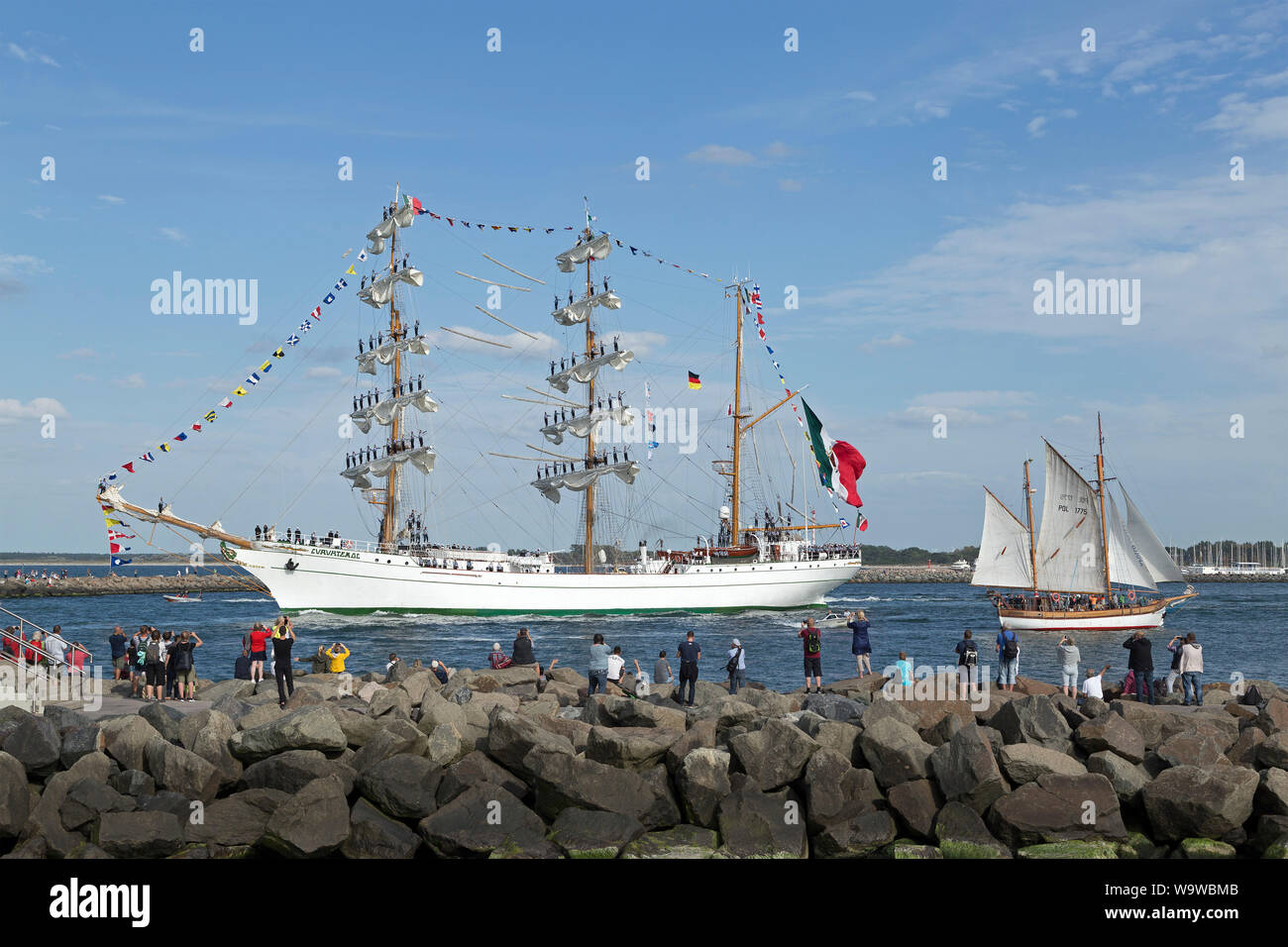 Mexican bark Cuauhtemoc leaving Hanse-Sail with sailors standing on the masts, Warnemünde, Rostock, Mecklenburg-West Pomerania, Germany Stock Photo