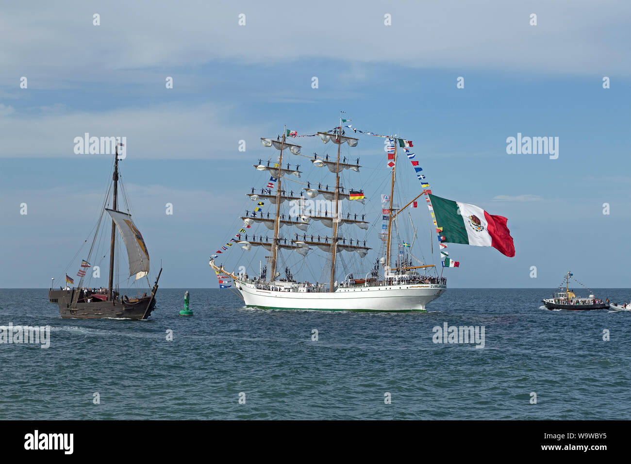 Mexican bark Cuauhtemoc leaving Hanse-Sail with sailors standing on the masts, Warnemünde, Rostock, Mecklenburg-West Pomerania, Germany Stock Photo