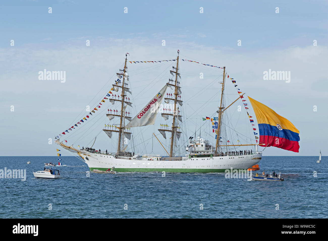 Columbian bark Gloria leaving Hanse-Sail with sailors standing on the masts, Warnemünde, Rostock, Mecklenburg-West Pomerania, Germany Stock Photo