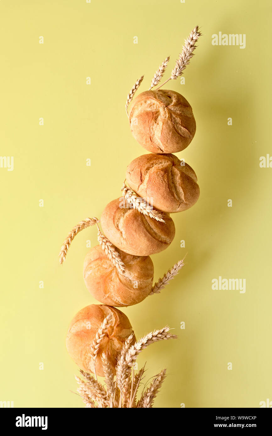 Pyramid of crusty round bread rolls, known as Kaiser or Vienna rolls ...
