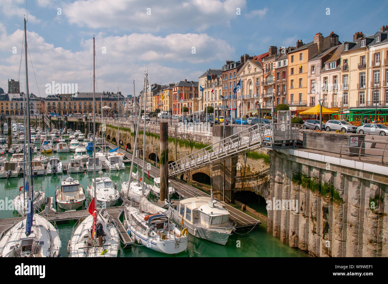 Various sailboats, yachts and leisure boats moored along the Henry IV quay in the Dieppe marina, Normandy France. Stock Photo