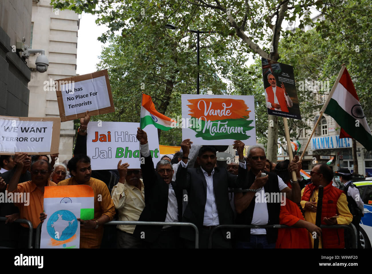 London, UK. 15th August, 2019. India supporters in front of India House in London, after its government scrapped the special constitutional status of Kashmir, clashing with protesters of Kashmir. Credit: Joe Kuis / Alamy News Stock Photo