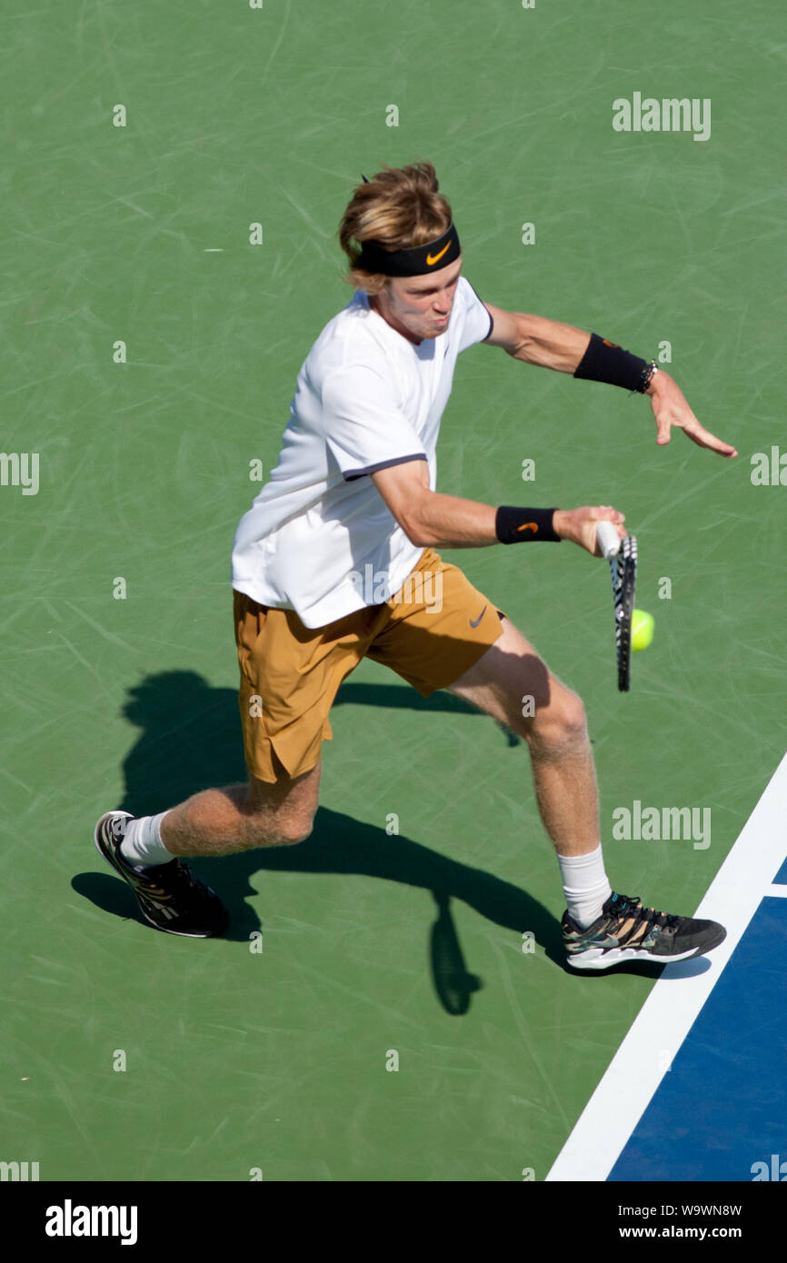 Cincinnati, OH, USA. 15th Aug, 2019. Western and Southern Open Tennis,  Cincinnati, OH; August 10-19, 2019. Andrey Rublev plays a ball against  opponent Roger Federerduring the Western and Southern Open Tennis tournament