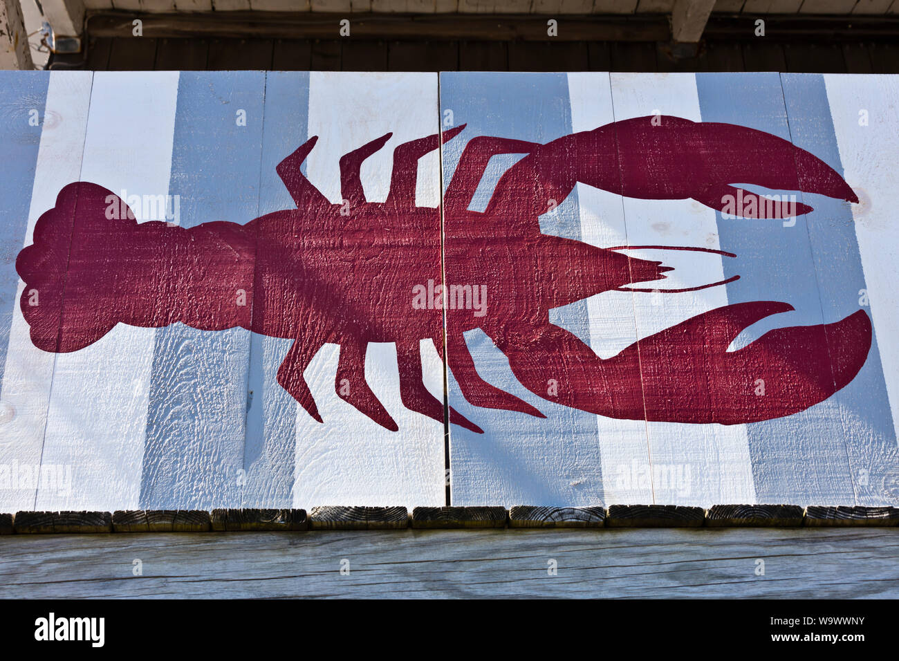 A sign advertising lobster in STONINGTON a major tourist destination - DEER ISLAND, MAINE Stock Photo
