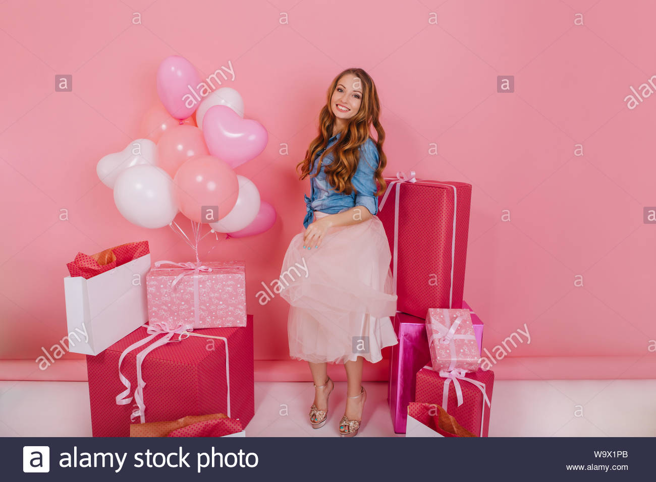Smiling Birthday Girl In Stylish Attire With Trendy Hairstyle