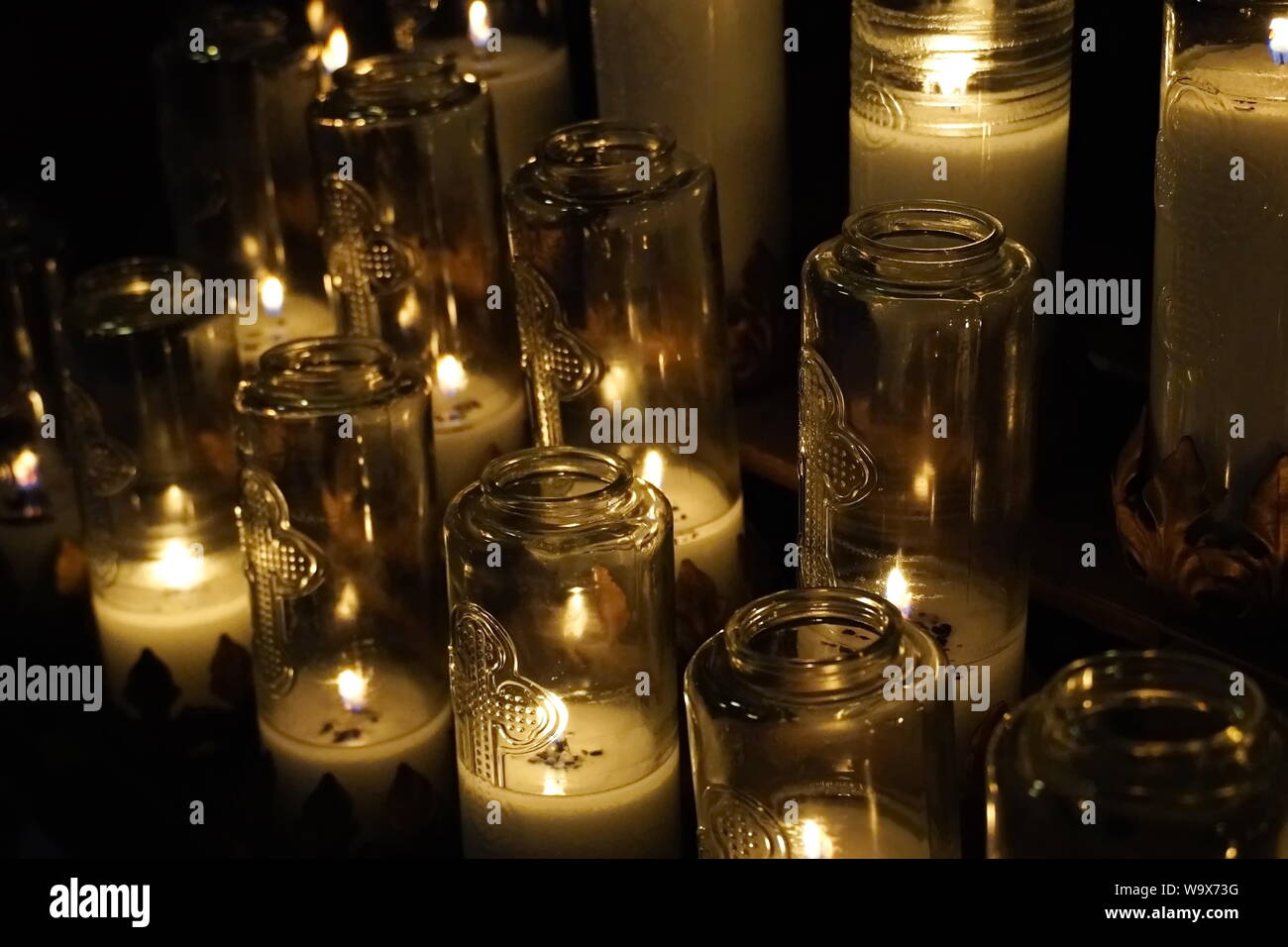 Montreal, Quebec / Canada July 25, 2019 White votive candles lit as