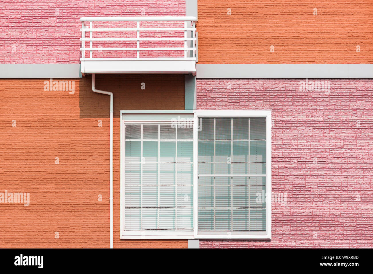 Exterior home design by colorful wall and window Stock Photo - Alamy