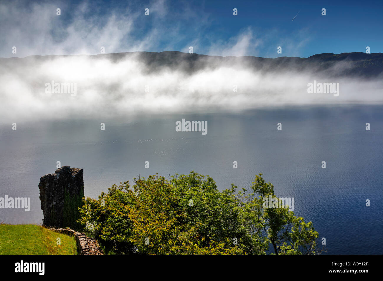 Urquhart Castle in the morning fog, Loch Ness, Scottish Highlands, Scotland, United Kingdom Stock Photo