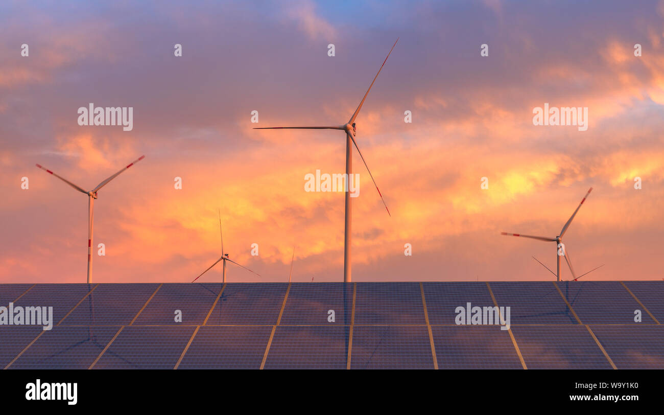 photovoltaic panels and wind turbines-the concept of renewable energy sources Stock Photo