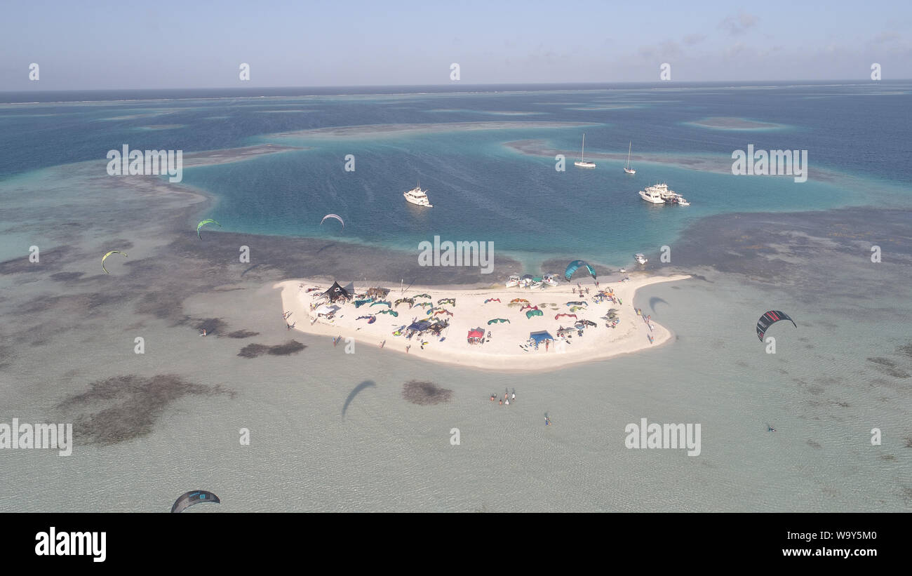 Aerial view of kitesurf sail and wind surf in Caribbean Sea Island in Los Roques Venezuela. Extreme Sport Activity Stock Photo