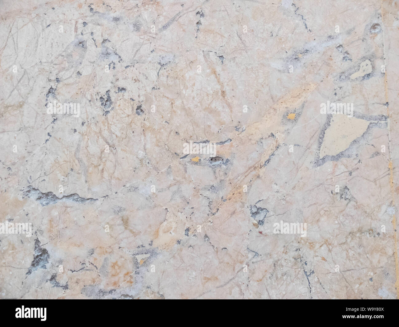 Yellow, orange and gray marble texture. Stone background seamless pattern. Stock Photo