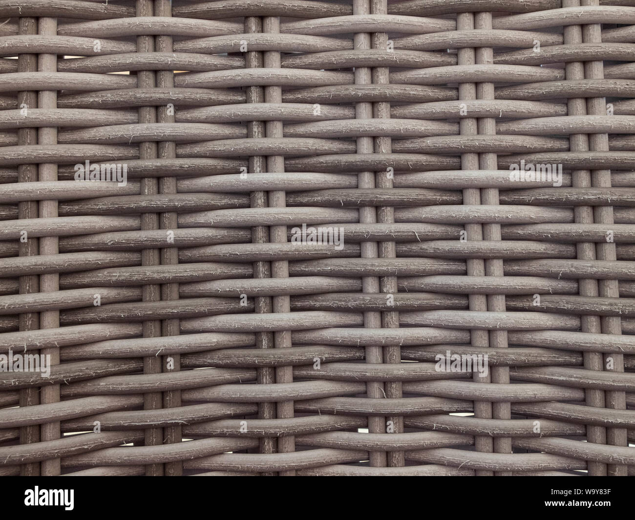 Woven natural furniture texture. Background seamless pattern. Stock Photo