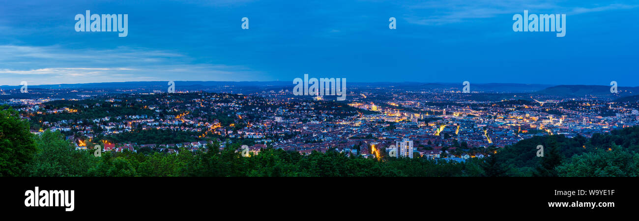 Germany, XXL panorama view over nature and city landscape of stuttgart from above birkenkopf viewpoint by night Stock Photo