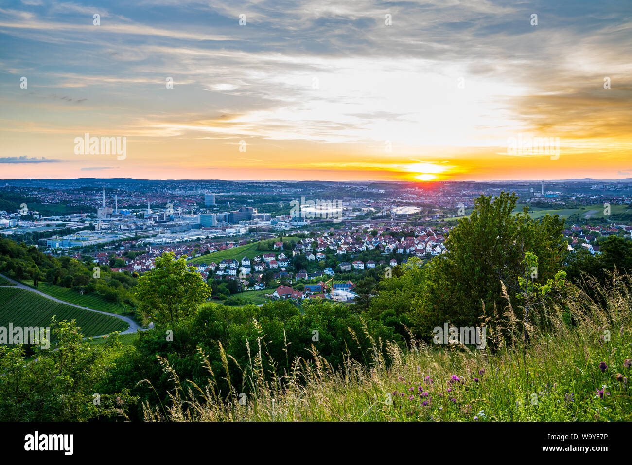 Germany, Orange summer sunset over skyline of downtown stuttgart city ...