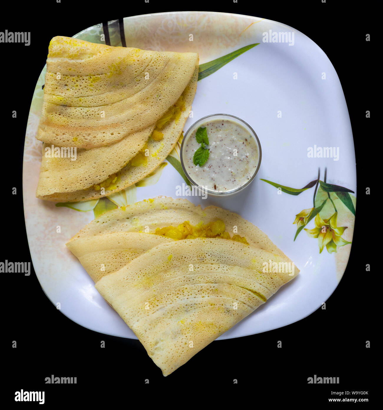 Masala Dosa with Coconut Chutney, South Indian Meal Served with Coconut
