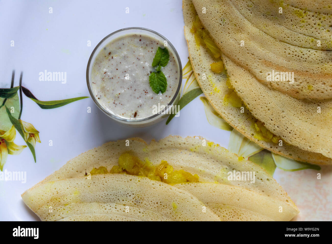 Masala Dosa with Coconut Chutney, South Indian Meal Served with Coconut