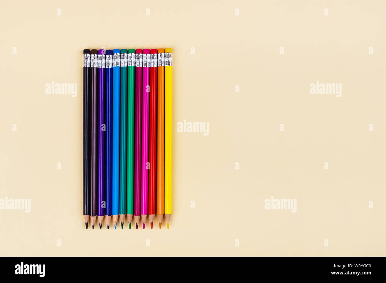 Back to school creative template with colored pencils. Stock Photo