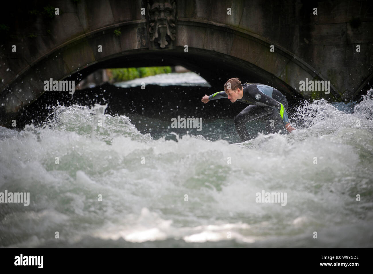 Surfing The The Eisbachwelle Munich Bavaria Germany Stock Photo