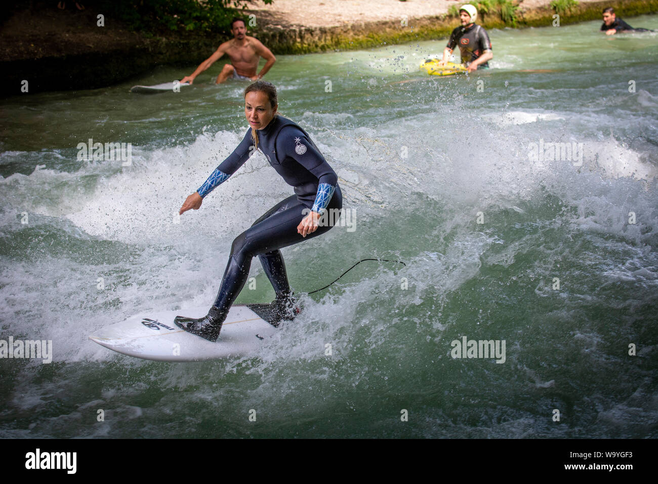 Surfing The The Eisbachwelle Munich Bavaria Germany Stock Photo