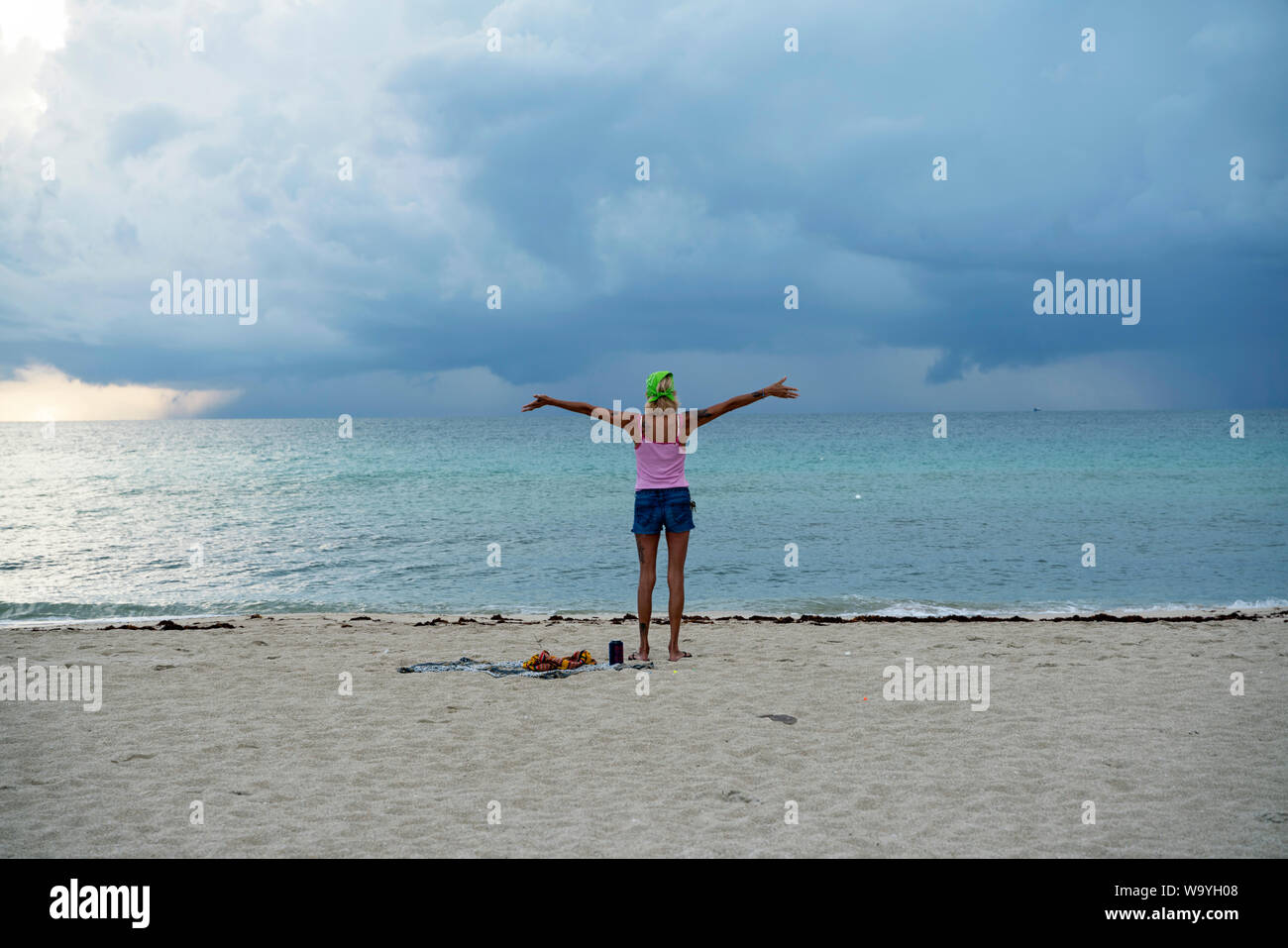 Yoga on Miami Beach at dawn Stock Photo Alamy