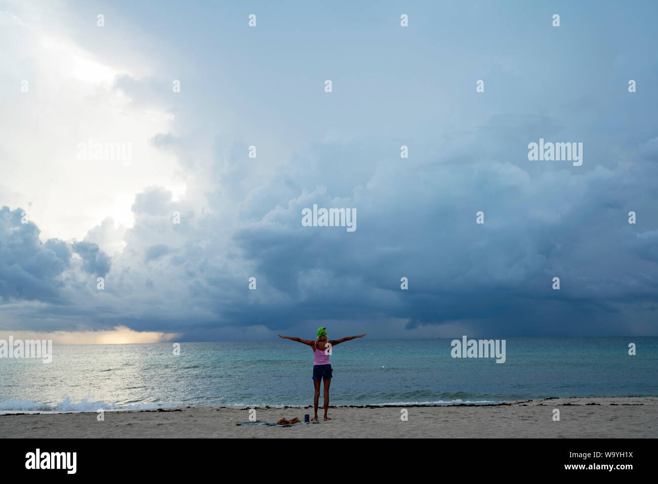 Yoga on Miami Beach at dawn Stock Photo Alamy