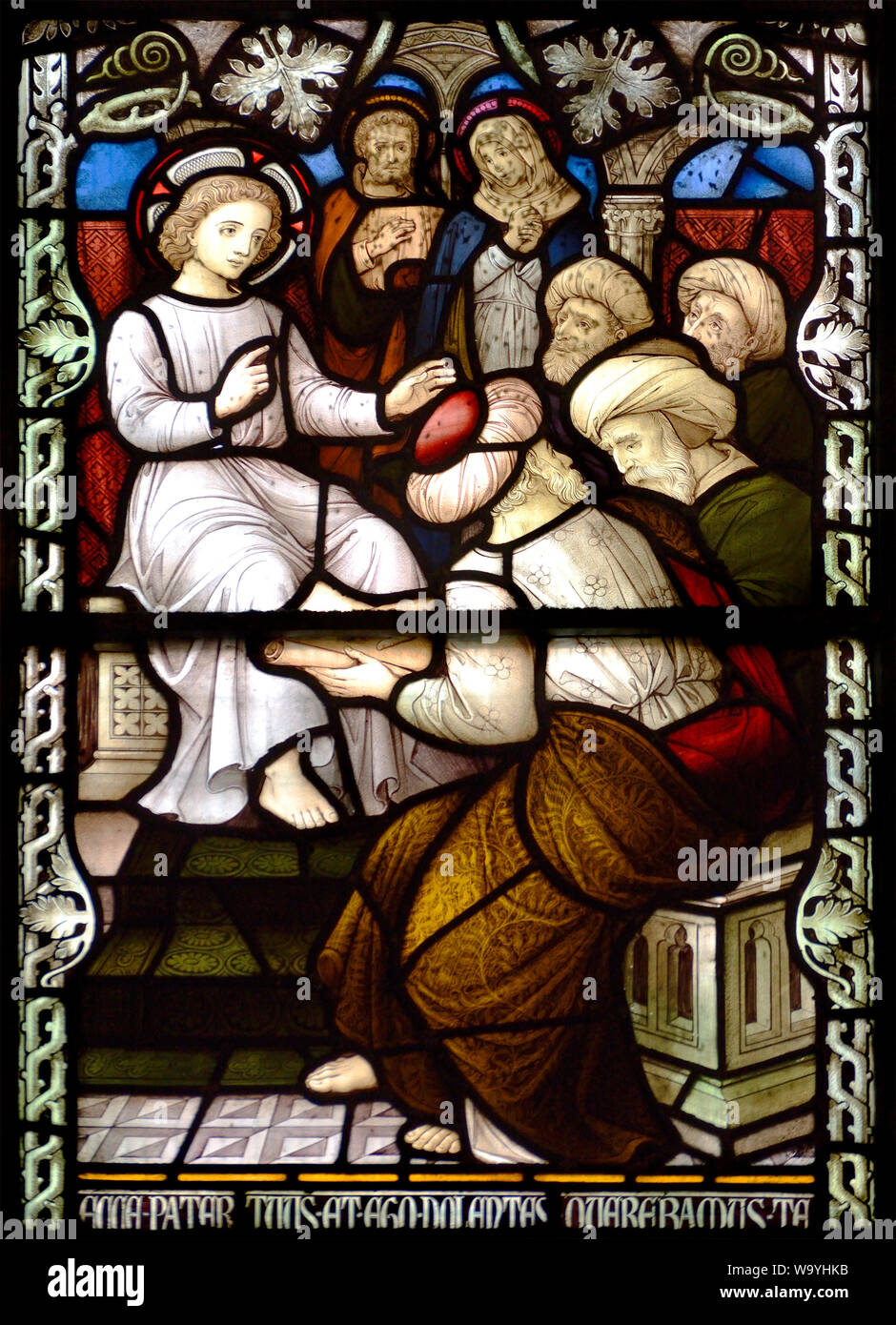 London, England, UK. Stained glass window in St James Roman Catholic Church, George Street/Spanish Place, Marylebone. Young Christ and doctors Stock Photo