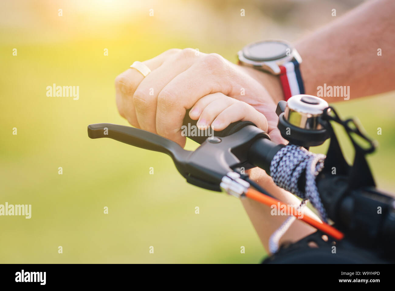 Electric kick scooters Environmentally conscious travel concept. Father and son playing in