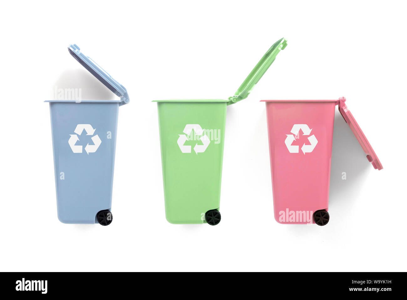Red, green and blue recycle bins with recycle symbol on white background Stock Photo