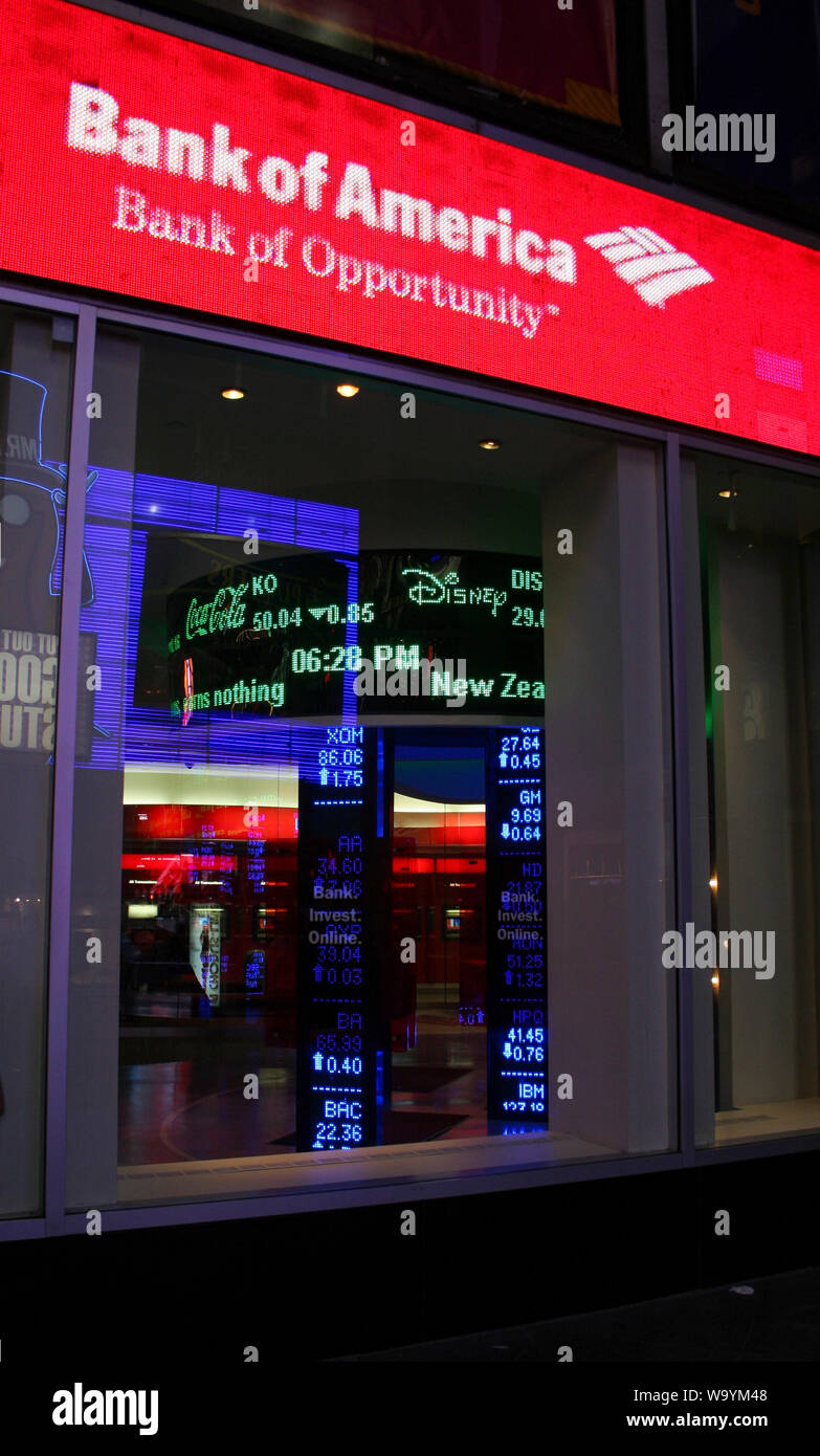 Mirroring With Stock Market Numbers In A Window To A Bank Of America Office Stock Photo Alamy