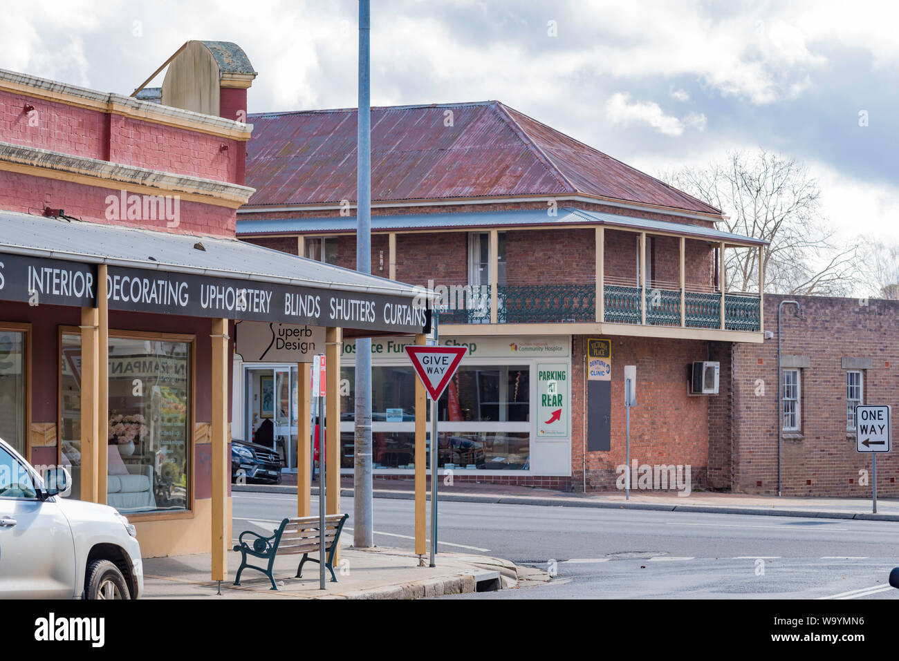 Looking from Station Street to Main Street, Mittagong to a two storey brick and corrugated iron roof building built in the mid to late 19th century Stock Photo
