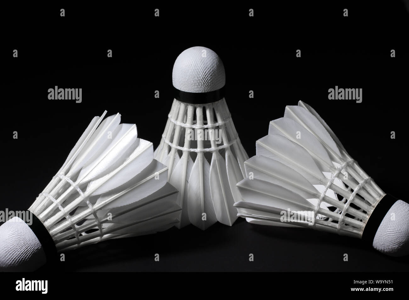 Shuttlecock used in badminton competition on a black background Stock