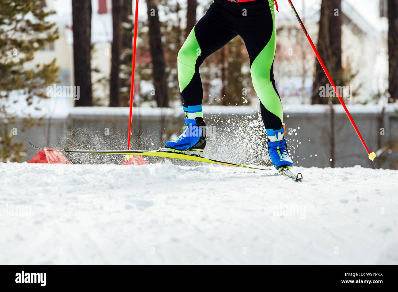 competition cross-country skiing snow splash from under ski of athlete Stock Photo