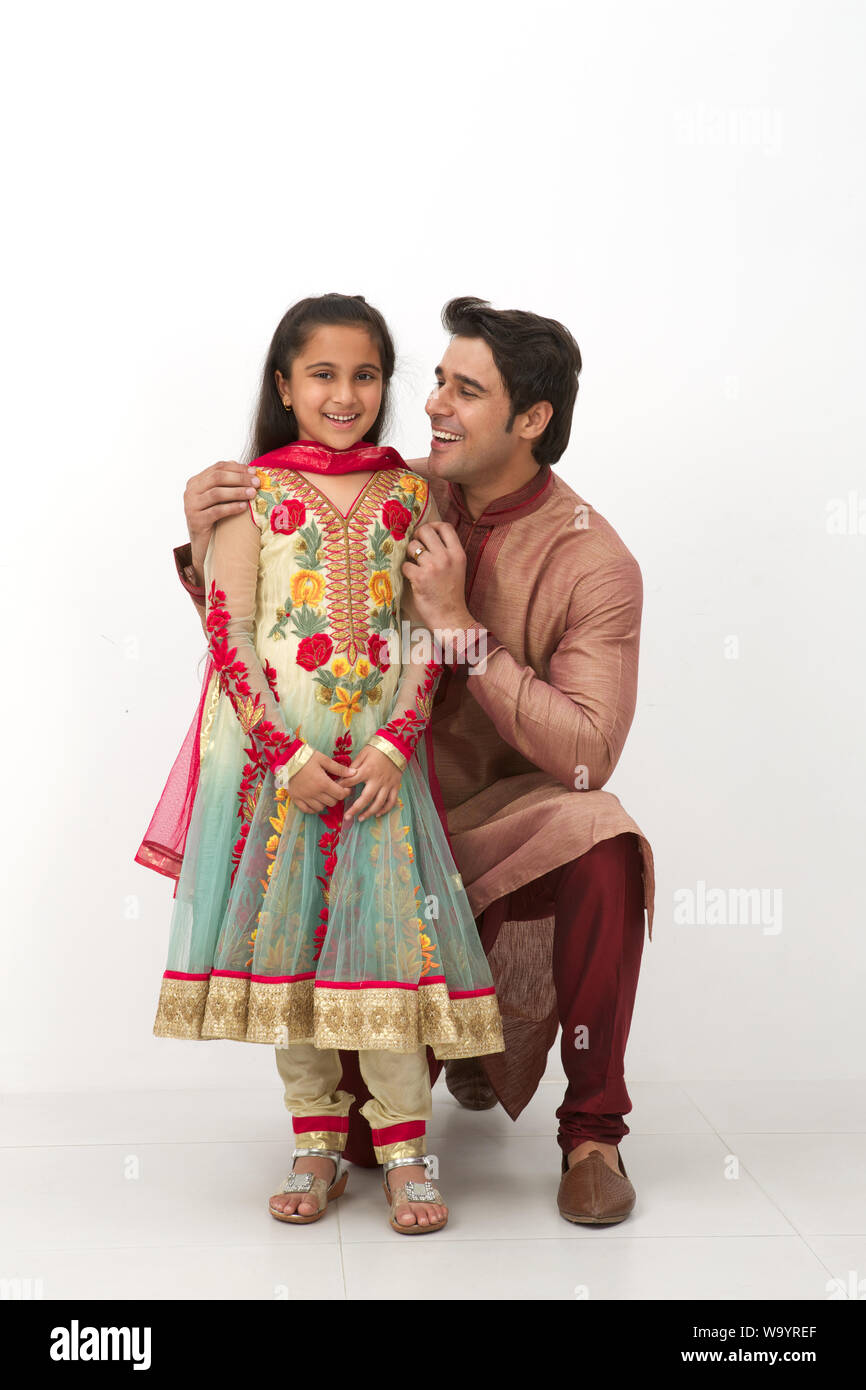 Man with his daughter and smiling Stock Photo