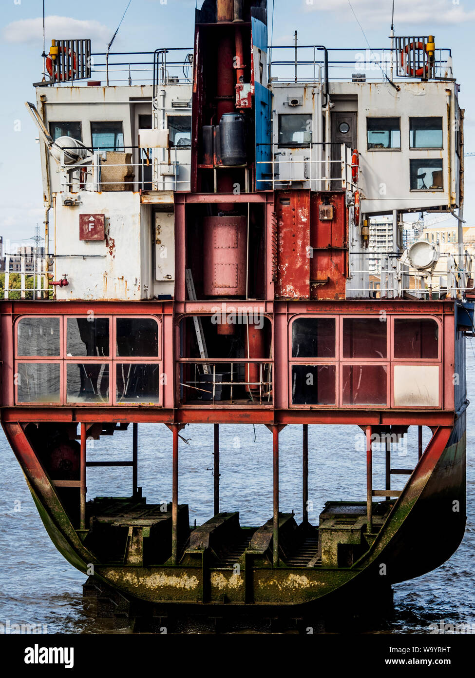 A Slice of Reality ship sculpture by Richard Wilson. Sliced vertical section through the former 800 ton dredger Arco Trent near the O2 Arena London. Stock Photo