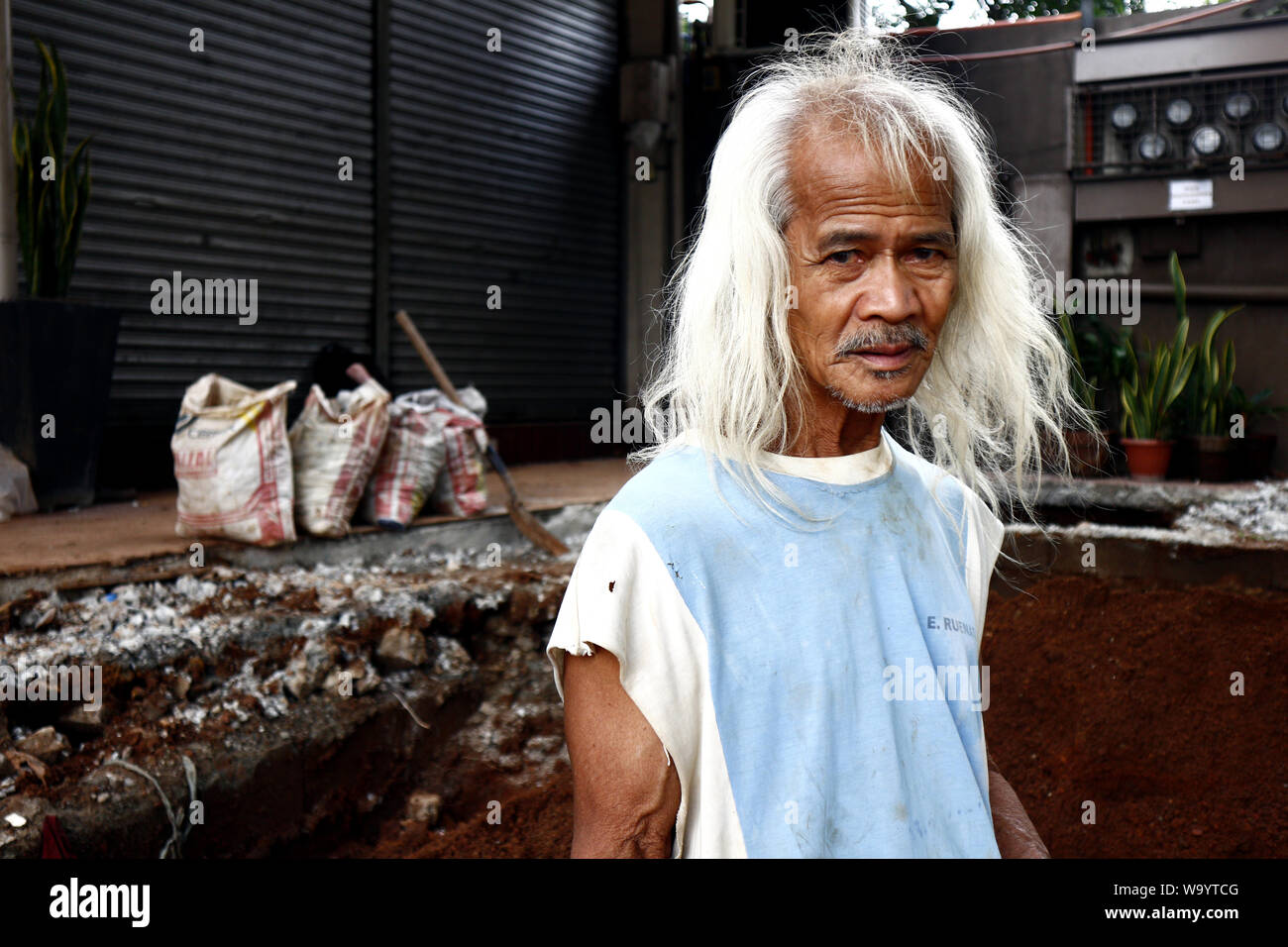 ANTIPOLO CITY, PHILIPPINES – AUGUST 12, 2019: An adult Filipino man with  long gray hair pose for the camera Stock Photo - Alamy