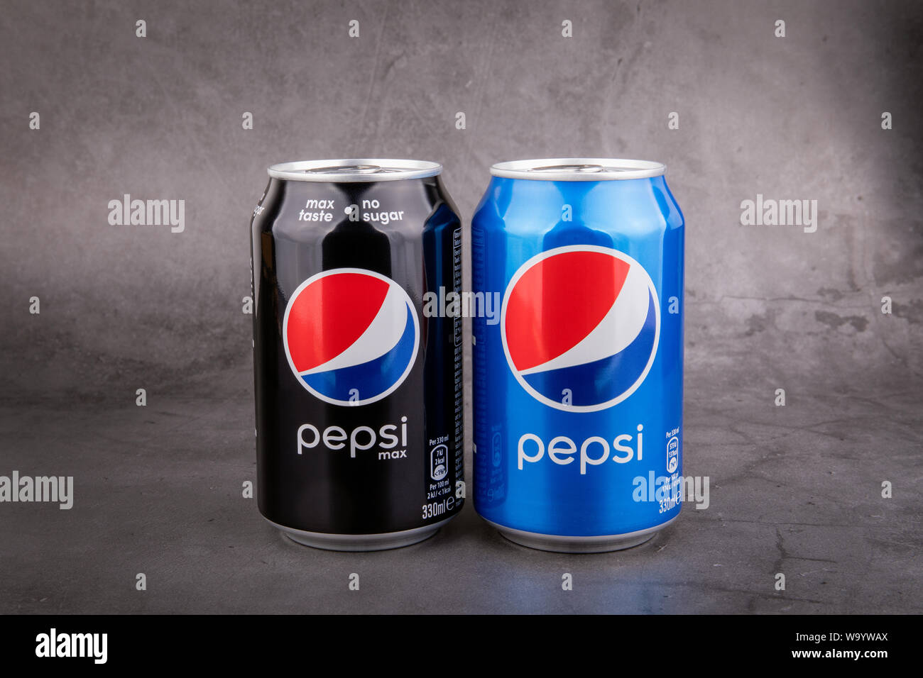 Black and Blue Pepsi can on dark background. Pepsi is a carbonated soft drink produced by PepsiCo Stock Photo