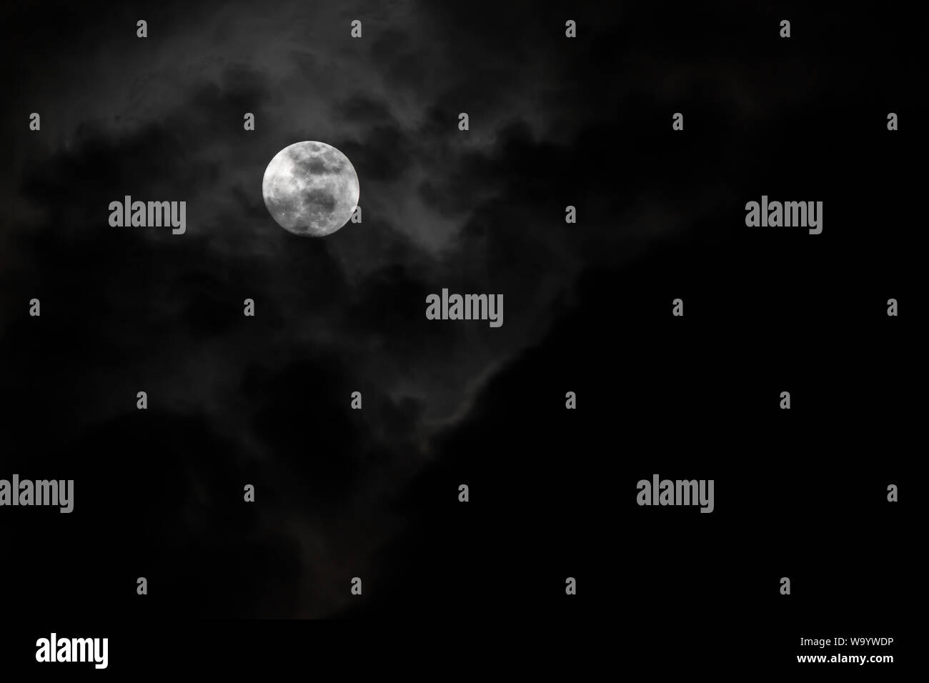 Moon Wind Moon and clouds in the sky on a quiet night with the wind blowing Stock ...