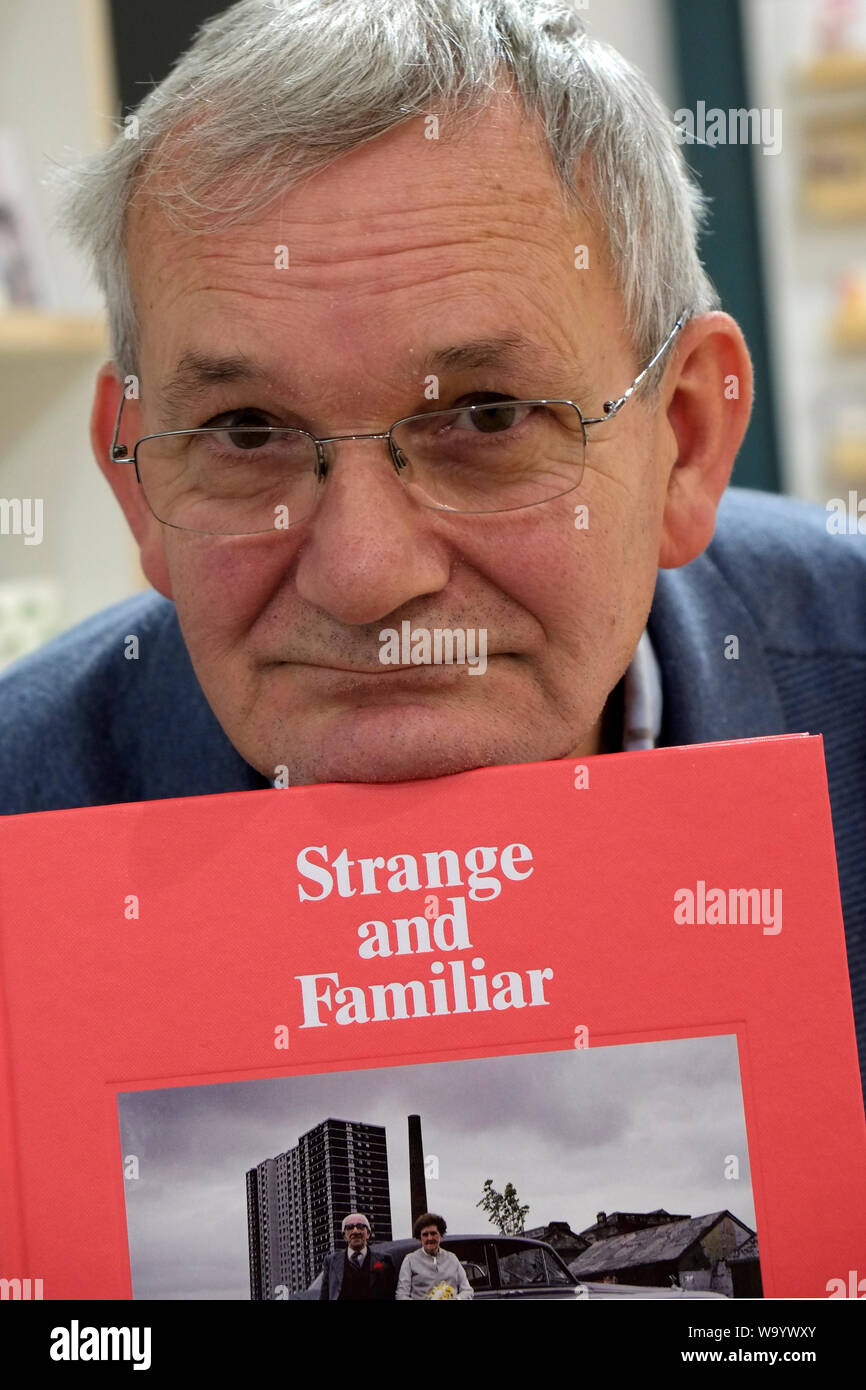 Photographer Martin Parr with the book from the exhibition “Strange and Familiar” which he co-edited with Alona Pardo. photo DON TONGE Stock Photo