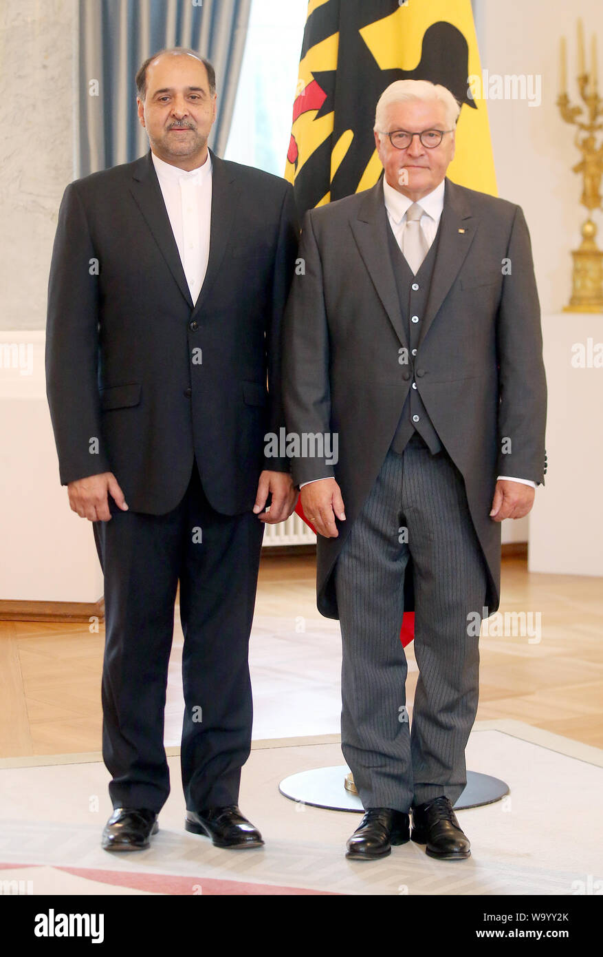 Berlin, Germany. 16th Aug, 2019. Federal President Frank-Walter Steinmeier (r) receives the new Iranian Ambassador to Germany, Mahmoud Farazandeh, for accreditation and receipt of the letter of credentials. Credit: Wolfgang Kumm/dpa/Alamy Live News Stock Photo