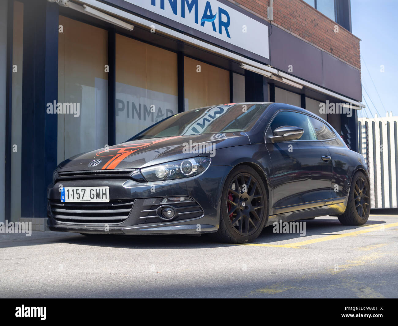 BARCELONA, SPAIN-AUGUST 14, 2019: Black  Volkswagen Scirocco (Third generation) at city streets Stock Photo