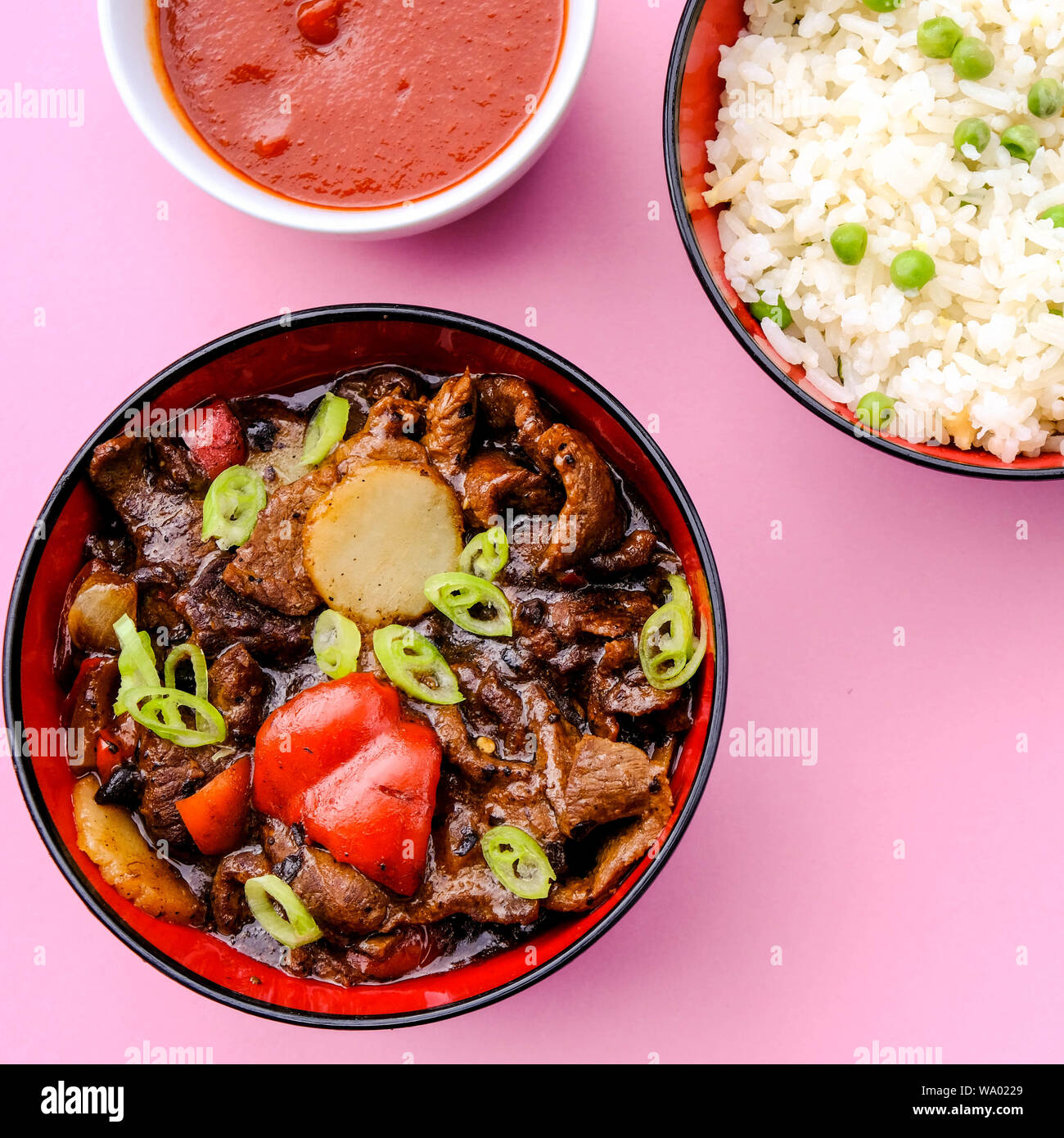 Chinese Style Beef in Black Bean Sauce With Egg Fried Rice Stock Photo