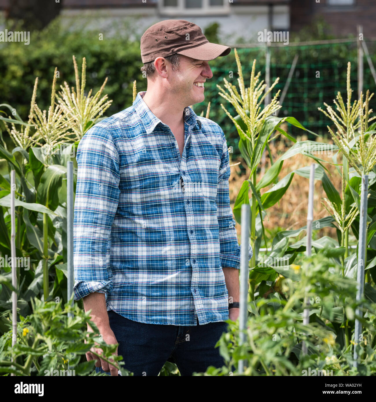 Popular TV presenter Matt Baker in casual clothes during filming the BBC Countryfile programme on an allotment. Stock Photo