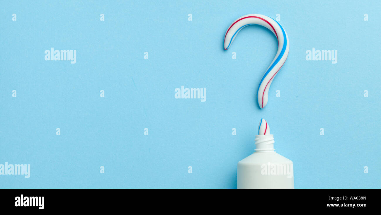 Question mark from toothpaste. Concept of choosing good toothpaste for