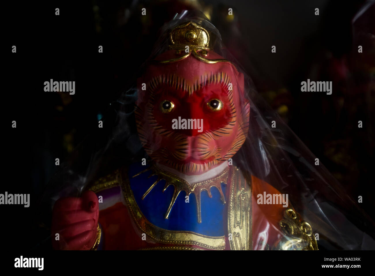 A Hindu Indian monkey god statue for sale in a religious shop in Kuching, Malaysia. Stock Photo